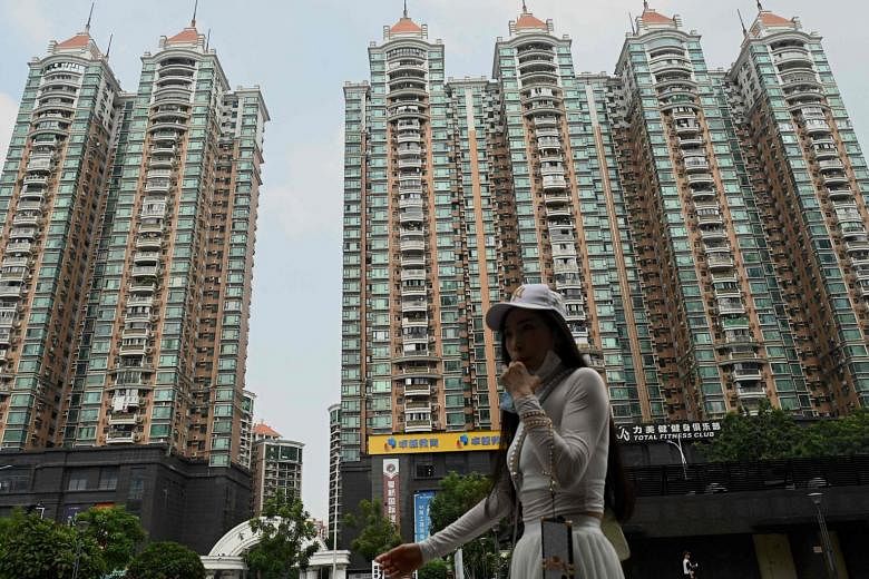 La Chine assouplit la répression sur le marché immobilier alors que les défauts de paiement des obligations d’entreprises offshore atteignent un nouveau record