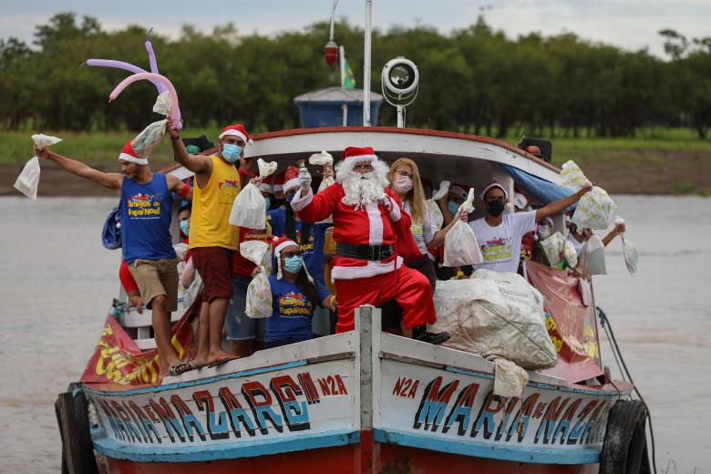 In Brazil's sweltering Amazon, Santa swops his sled for boat | The ...