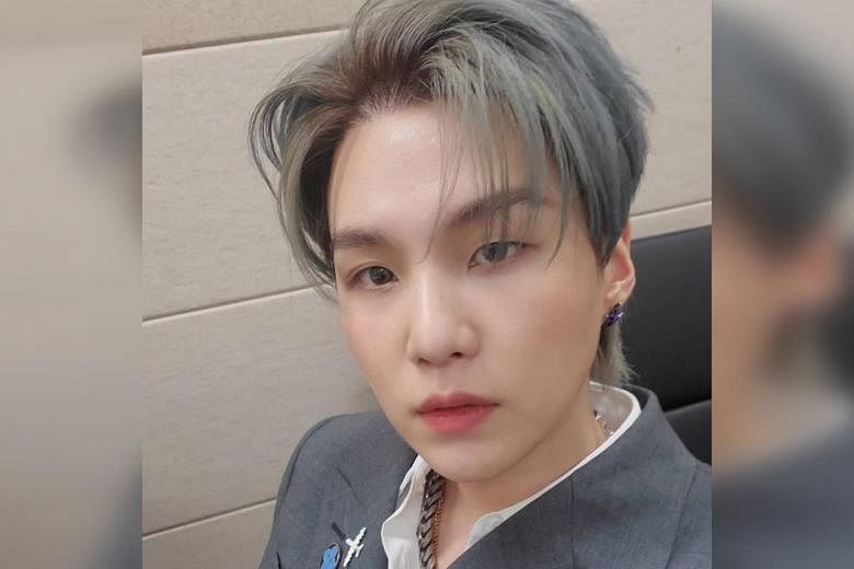 K-pop star Suga tests positive for COVID-19 after BTS return from U.S.