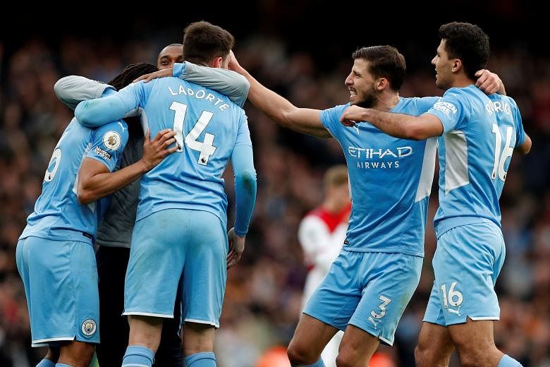 Football: Man City move 11 points clear, West Ham, Spurs close in on top four - The Straits Times
