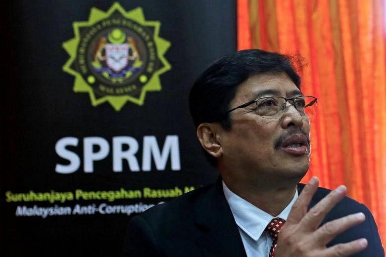 Malaysia mengatakan tidak dapat menyimpulkan jika ketua antikorupsi melanggar hukum tentang pembelian saham