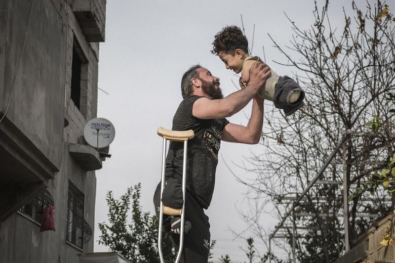Une photo virale aide à amener une famille de réfugiés syriens en Italie