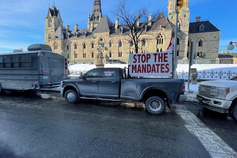 Trucker Covid-19 vaccine rule brings polarising protest to Canada's capital