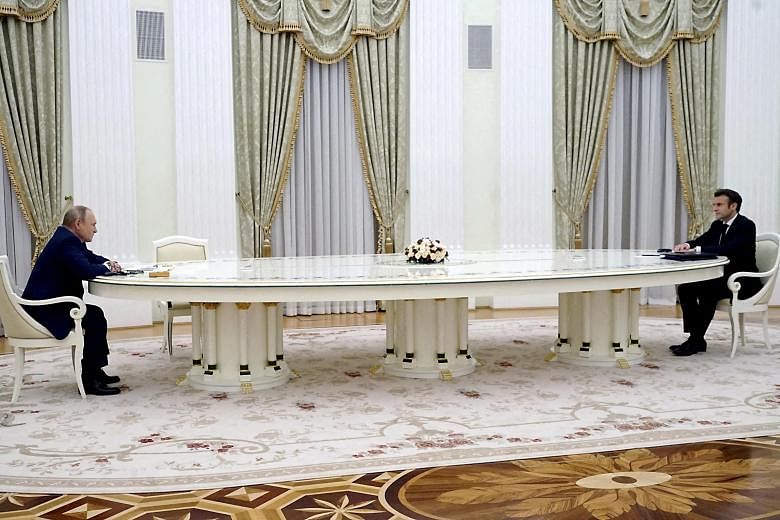 Kremlin's vast Italian table turns heads after being used in Putin-Macron talks