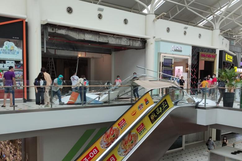 Hoarding board at Jurong Point store under renovation falls and injures
