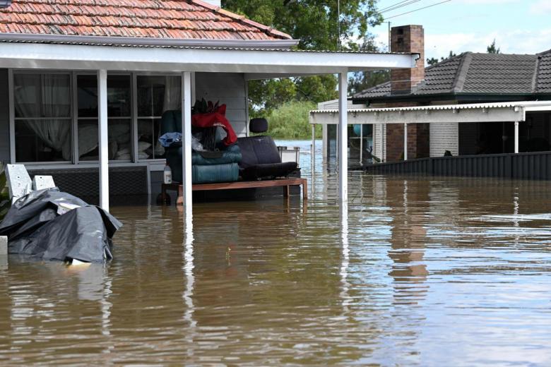 Thousands of Australians return to 'uninhabitable' homes as floods ...