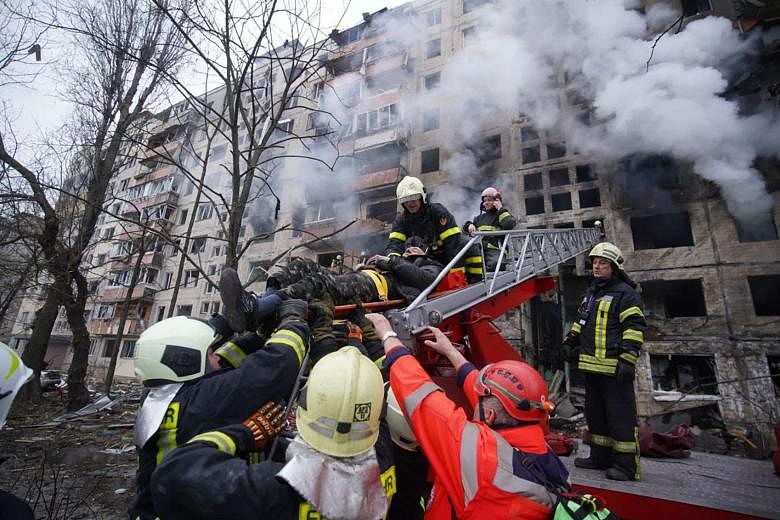 In Pictures: Residential apartment block in Kyiv hit by shelling | The ...