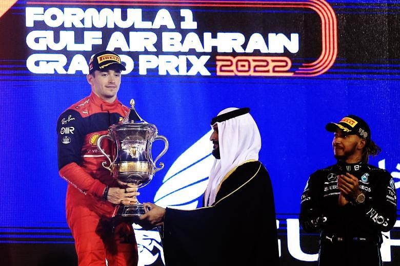 Race winner Charles Leclerc celebrate on the podium with the trophy, Formula  1 photos