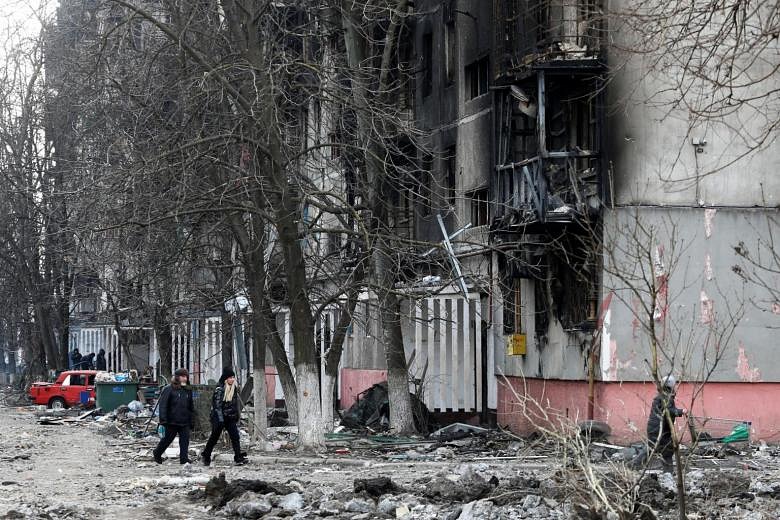 'Hellscape' in Ukraine's Mariupol but Russia talks tough | The Straits ...