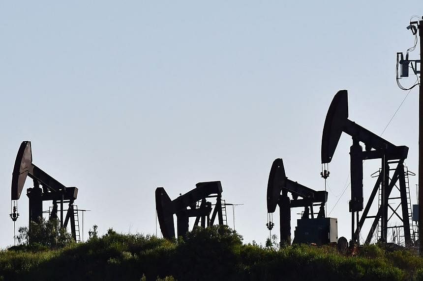 Oil settles lower on doubts about Russia oil sanctions | Flipboard