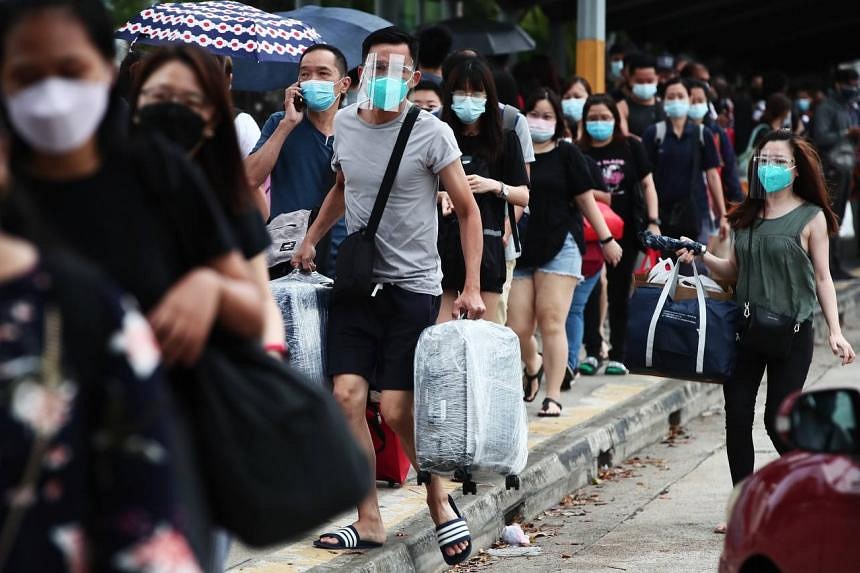 Hong Kong cuts COVID hotel quarantine to 3 days for arrivals