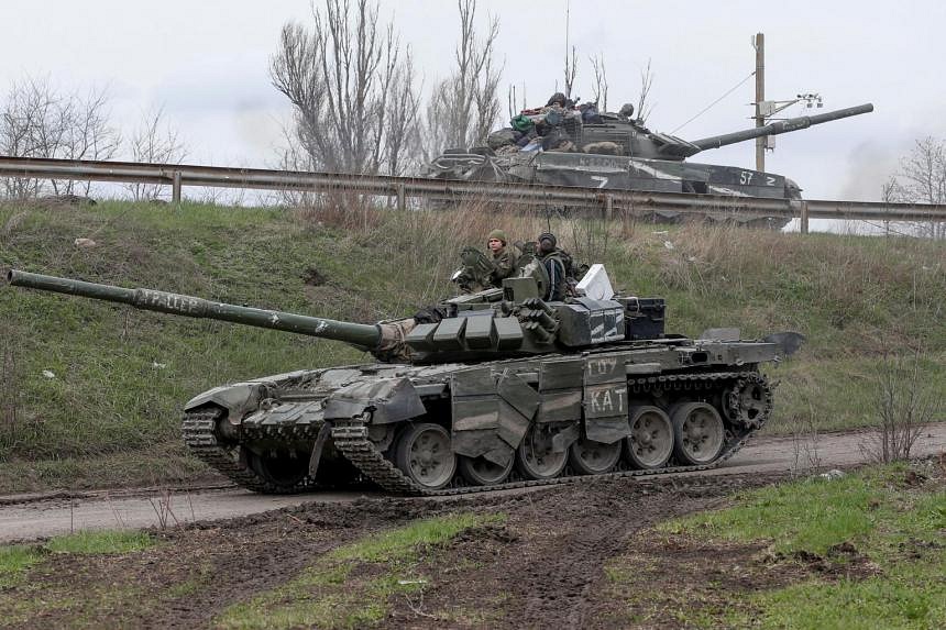 Ukrainian troops in country's east risk being encircled in new Russian ...