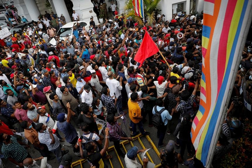 Sri Lanka's Parliament reconvenes as PM warns of hardship | The Straits ...