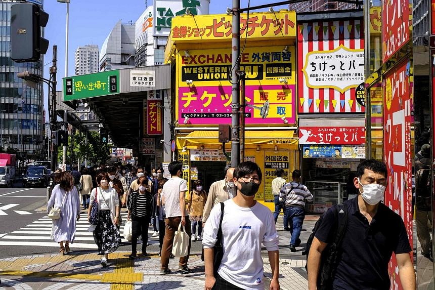 Singaporeans should continue to wear masks if unwell even after Covid ...