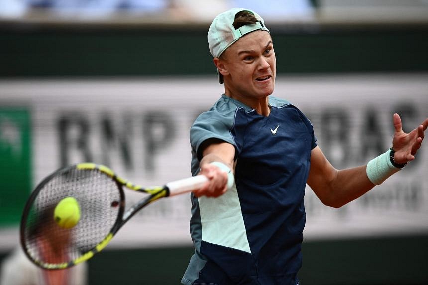 Tennis: Rune stuns Tsitsipas at French Open as Russian women shine ...