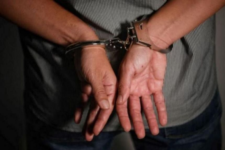Singapore fugitive nabbed while on holiday in Johor Baru over stolen $1 million