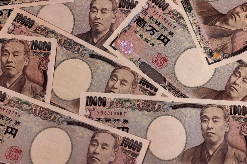 Yen slides to two-decade low as interest rate gap widens