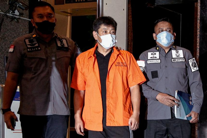 Indonesia deports Japanese fugitive accused of Covid-19 relief fraud ...