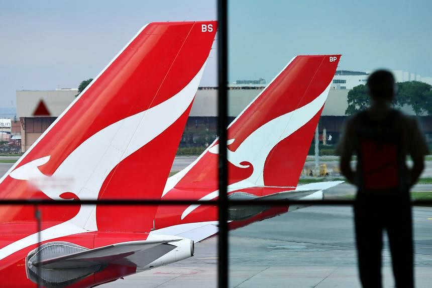 Qantas slashes flights in Australia as high oil prices bite