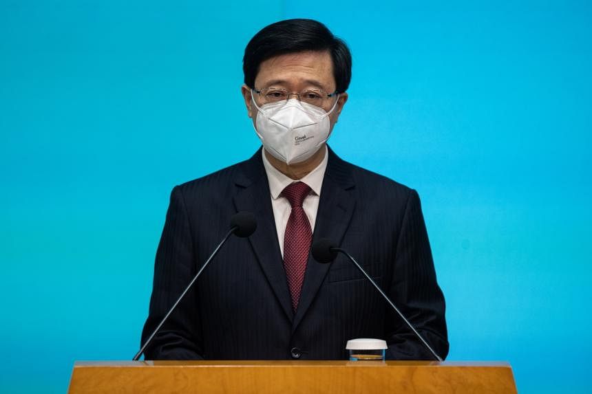 Hong Kong leader rejects 'living with the virus' Covid-19 policy