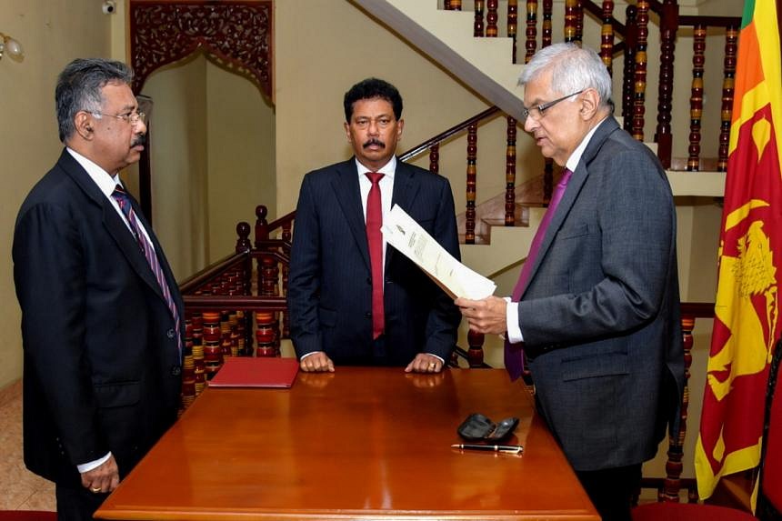 Wickremesinghe Sworn In As Sri Lanka's Acting President After Speaker ...