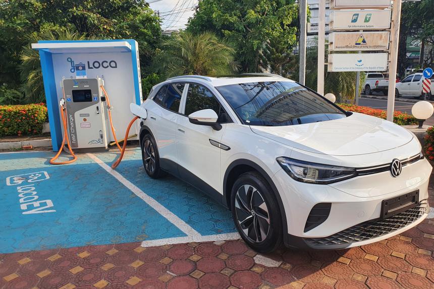 Ridehailing firm's EV answer to inflation in Laos The Straits Times