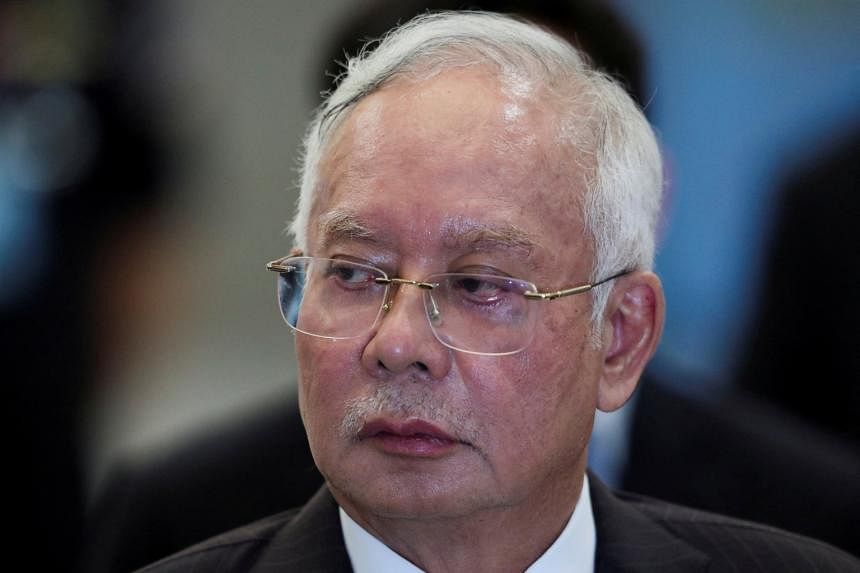 Malaysia's imprisoned ex-PM Najib retains MP status after filing for