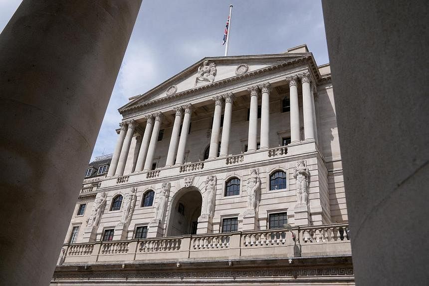 BOE raises rates by a half-point as push begins for bigger moves - The Straits Times