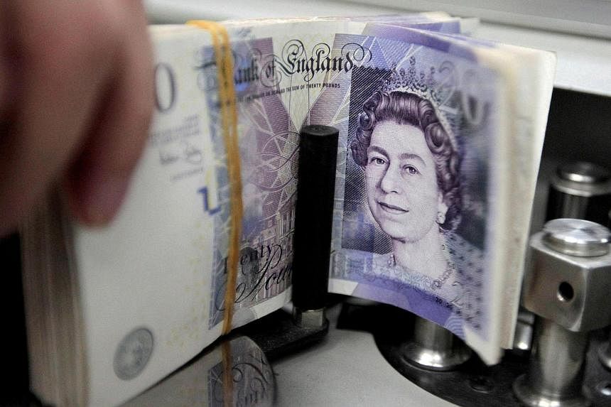 Borrowing costs surge, sterling tumbles after Britain's new economic plan - The Straits Times