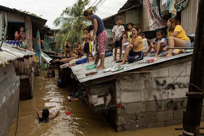 In Pictures: Super Typhoon Noru lashes Philippines | The Straits Times