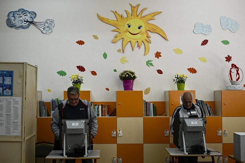 Tired of gridlock, Bulgarians vote in fourth election in less than 2 years