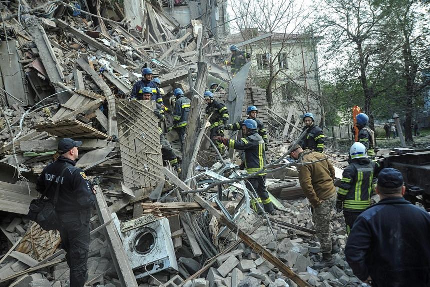 Russian Missile Strike Kills Woman, Destroys Apartment Block In Ukraine ...