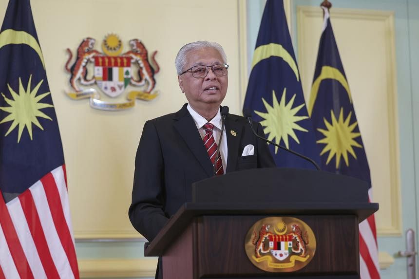 Malaysia's PM Ismail dissolves Parliament for snap elections; King 'disappointed' at political developments