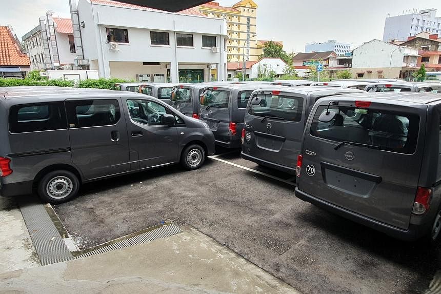 Up to 700 new vans gathering dust in S'pore after failing to get tax  incentive | The Straits Times