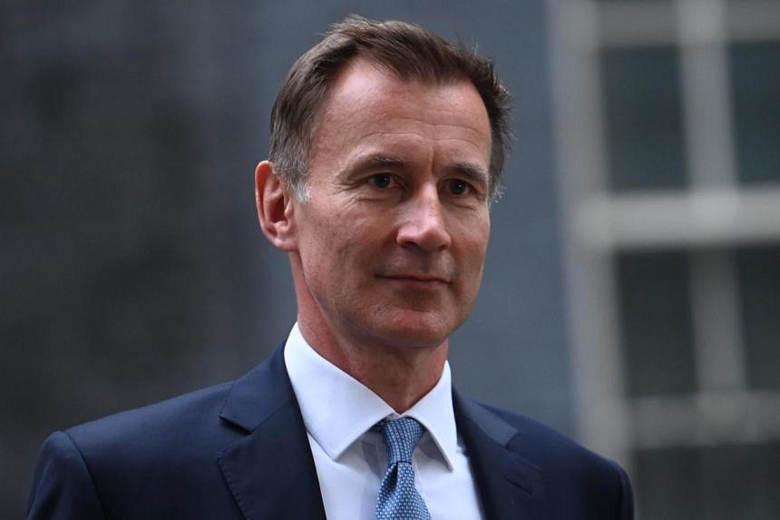 As UK PM Truss fights for job, new finance minister Hunt says she made ...