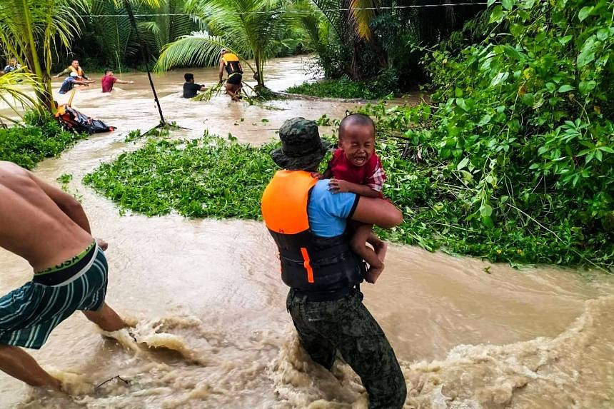 A 'rumbling' in the dark: Philippine mum recounts landslide escape ...