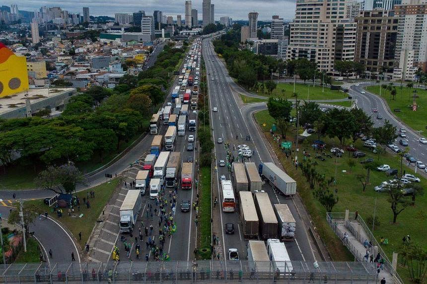 Brazil's Bolsonaro urges protesters to lift road blockades