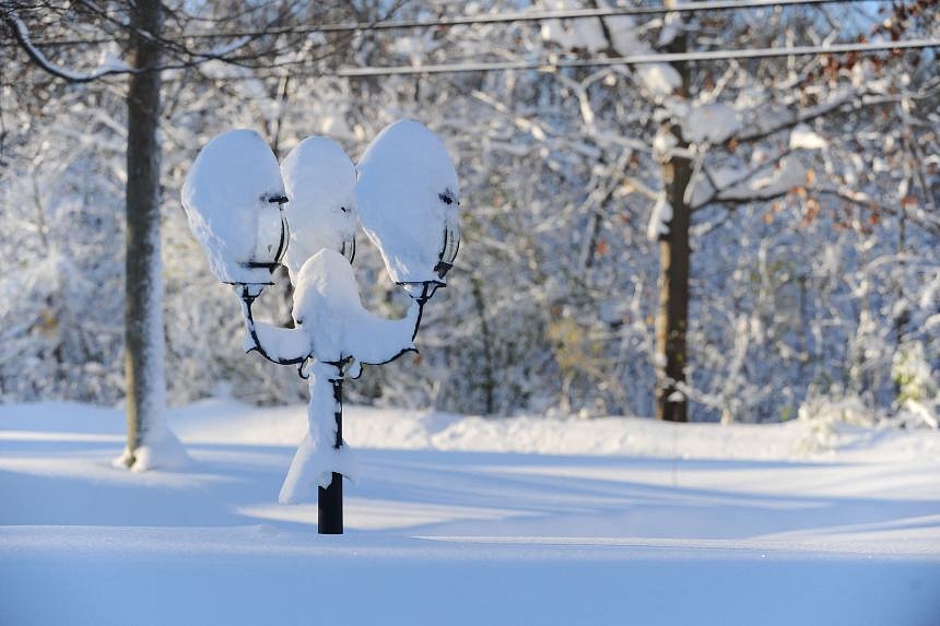 Snowstorm batters western New York, restricting travel ahead of busy Thanksgiving holiday