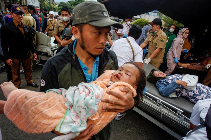 Hunt For Buried Survivors After Indonesia Quake Kills At Least 162 ...