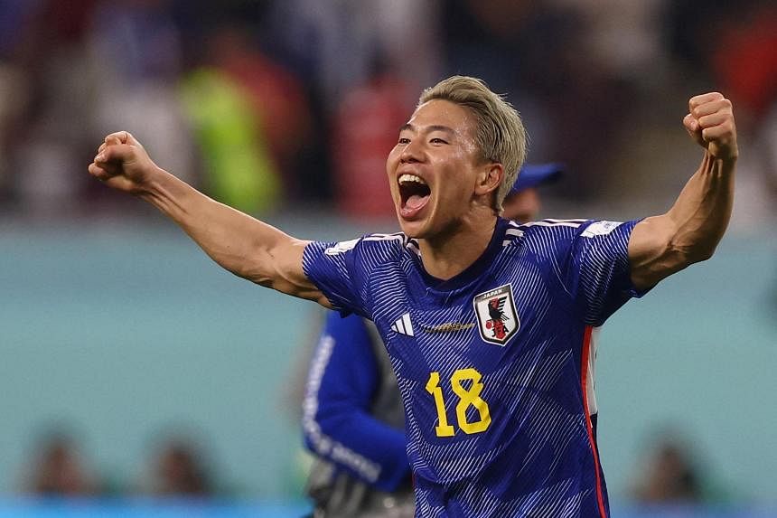 Japan roars back again to shock Spain and top group