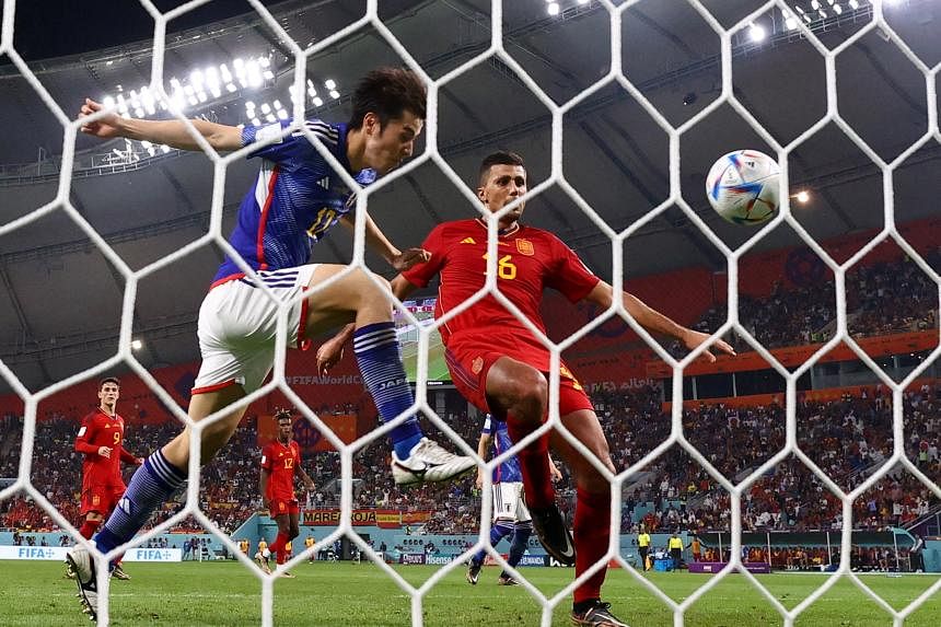Japan stun Spain but both sides advance, Football News