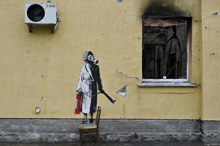 Group cut Banksy mural off battle-scarred Ukraine wall | The