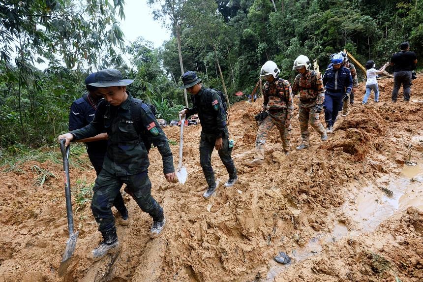 Search and rescue operations for Batang Kali landslide victims enter ...