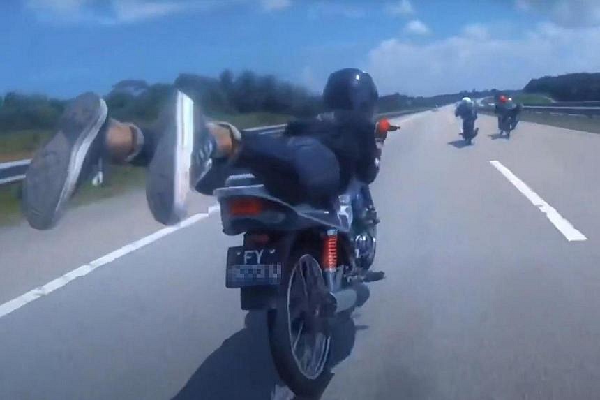 Singapore Bikers Perform Risky Stunts At High Speeds On Malaysian ...