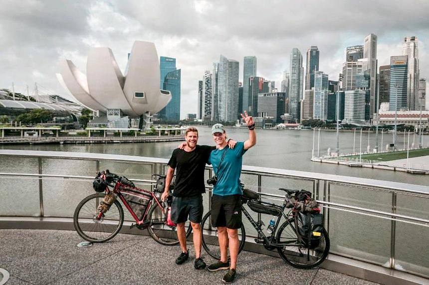 'Life is boring when everything meets expectations': 2 Finns cycle 15000km from Finland to Singapore - The Straits Times
