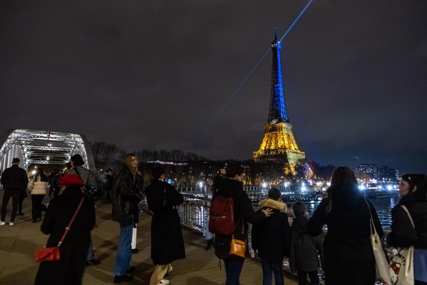 Eiffel Tower lights up in Ukraine colours The Straits Times