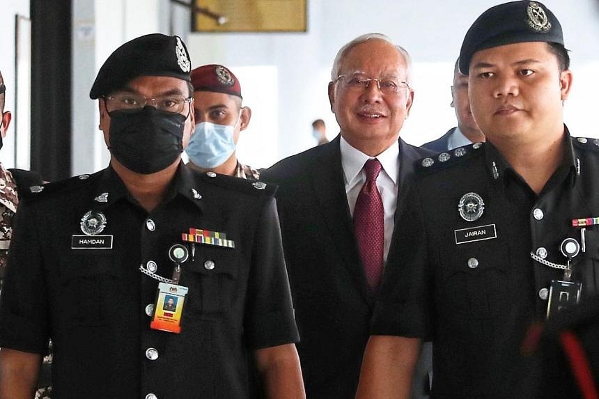 Malaysian Jailed Ex-leader Najib Acquitted Of Audit Tampering Charge ...