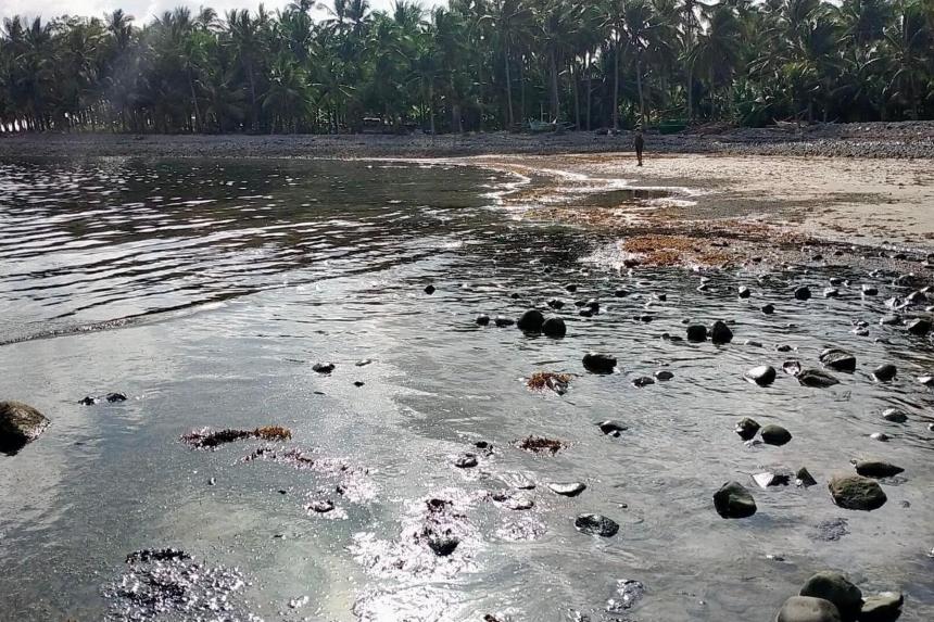 Residents fall sick as Philippine oil spill spreads across coastal