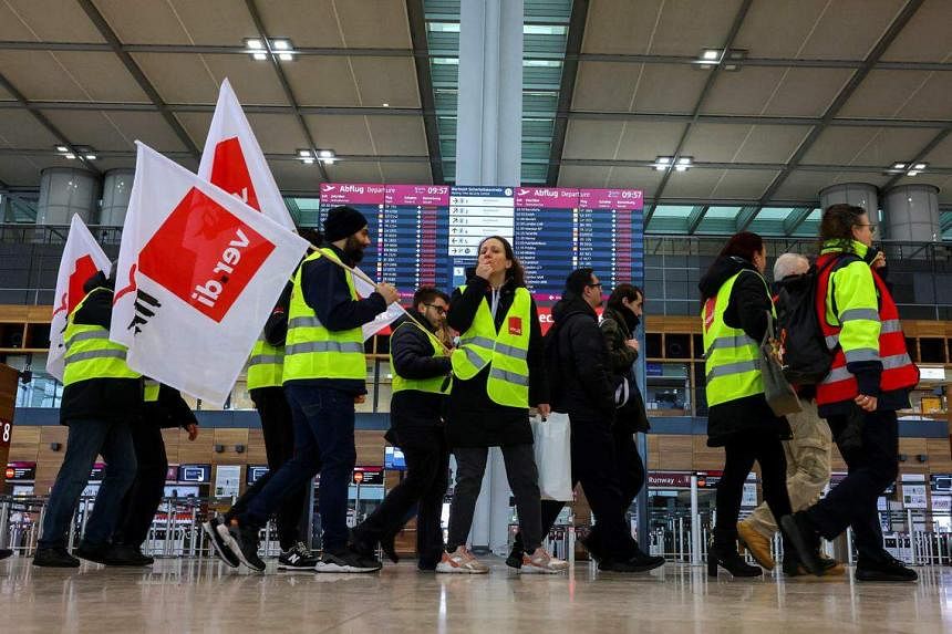German airports face fresh disruption as staff plan pay strike The Straits Times