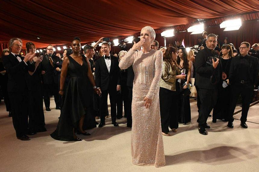 Stars walk champagne carpet as blockbuster films compete for Oscars